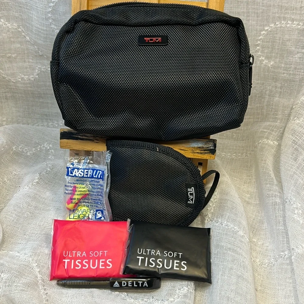 TUMI new never used cosmetic bag with some goodies